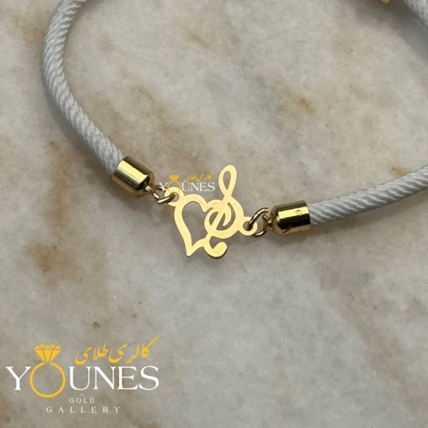 دستبند قلب و ملودی طلا لیزری